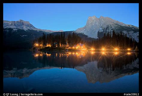 Picturephoto Lighted Cabins And Mountains Reflected In Emerald Lake