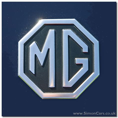 British Made Mgb Mgbgt And Mg Midget Noir And Chrome Front Grill Badge Mg