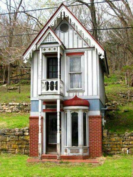 Cozy And Charming Tiny Victorian House With Red Brick Foundation And