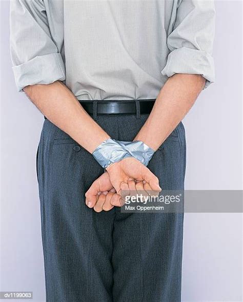 hands tied behind her back photos and premium high res pictures getty images