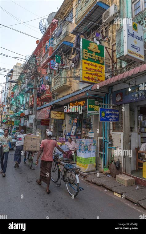 People Shops And Coffee Shops In A Street Of Yangon Yangoon Myanmar