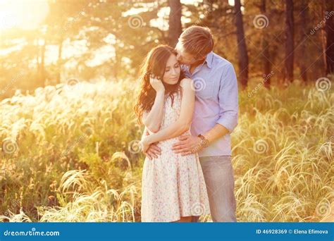 Young Couple In Love At Sunset At The Field Stock Image Image Of