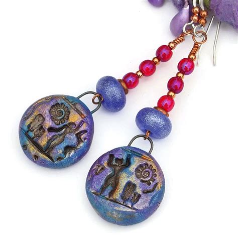 Glass, resin, gemstone, plastic, polymer clay, porcelain etc. Hieroglyphs Earrings, Polymer Clay Blue Purple Gold ...