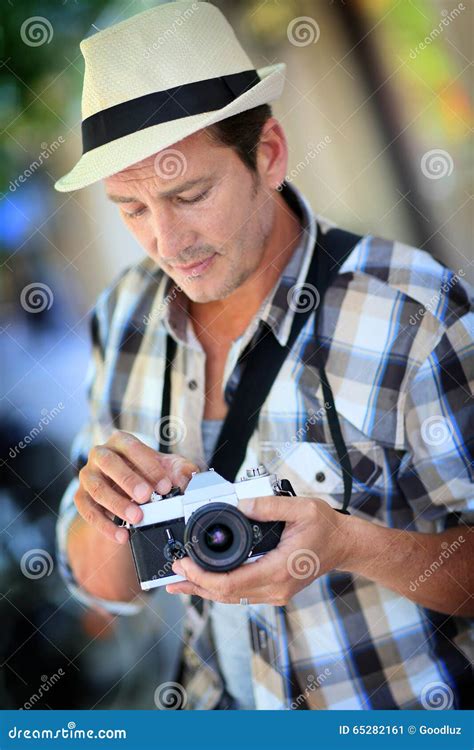 Man Photographer Using Retro Camera Stock Image Image Of Outdoors