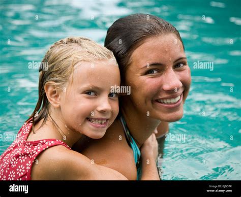 Two Girls In A Swimming Pool Stock Photo Alamy