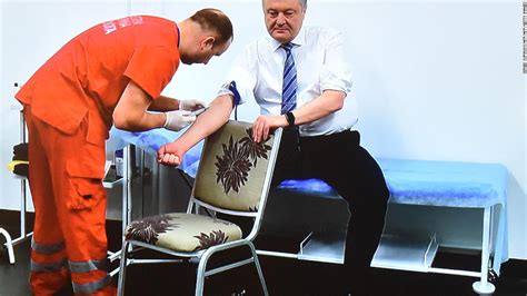 ukraine president takes drug test before debating comedian in 70 000 seater stadium cnn