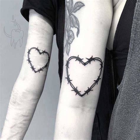 heart-shaped-matching-barbed-wire-tattoos-for-a-couple-emo-tattoos,-matching-tattoos,-tattoos