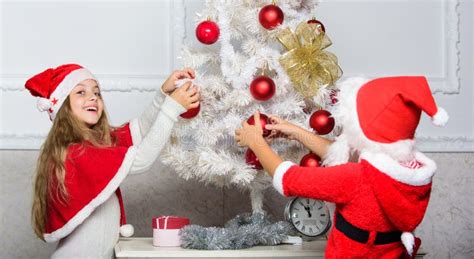 Cherished Holiday Activity Kids In Santa Hats Decorating Christmas