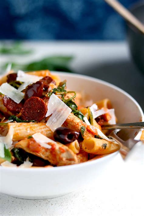 Season and simmer for 10 minutes. Chicken and Chorizo Pasta with Spinach - The Last Food Blog