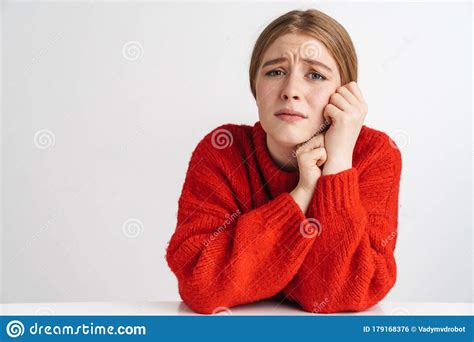 Photo Of Unhappy Upset Sad Negative Mood Scared Frightened Girl Bite Lips Worrying Isolated On