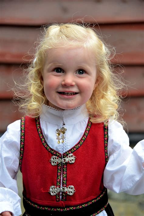 Little Girl Wearing Bunad In Flåm Norway Encircle Photos