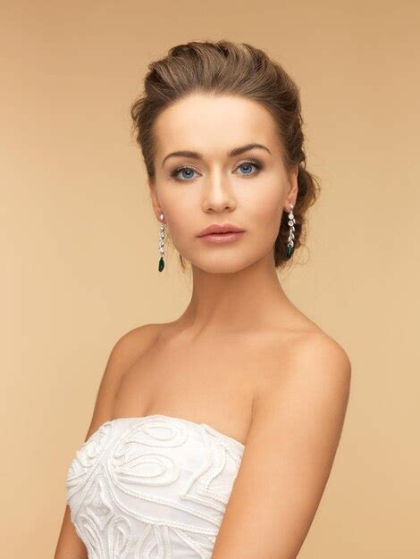 Premium Photo Beauty And Jewelery Concept Woman Wearing Shiny Diamond Earrings