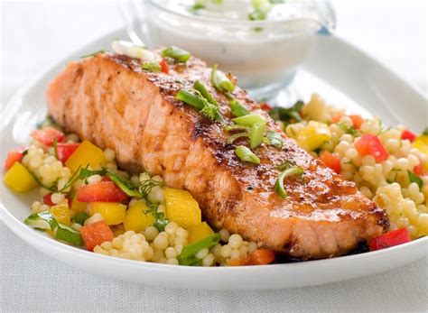 How to make light and healthy couscous salad with a simple lemon vinaigrette, cucumber and herbs. Salmon and Couscous Salad | Balloonica | Copy Me That