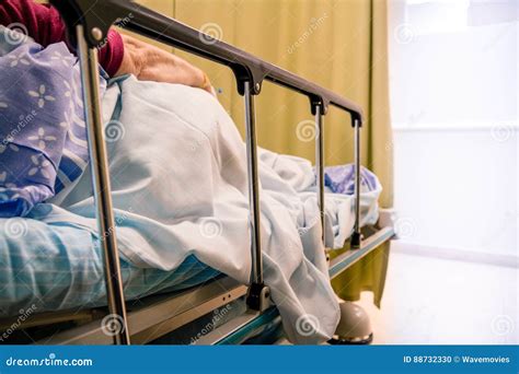 Woman Patient Lying On A Bed In A Hospital Room Royalty Free Stock Image