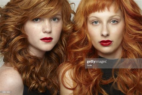 Two Redheads With Long Curls Standing Side By Side Photo Getty Images