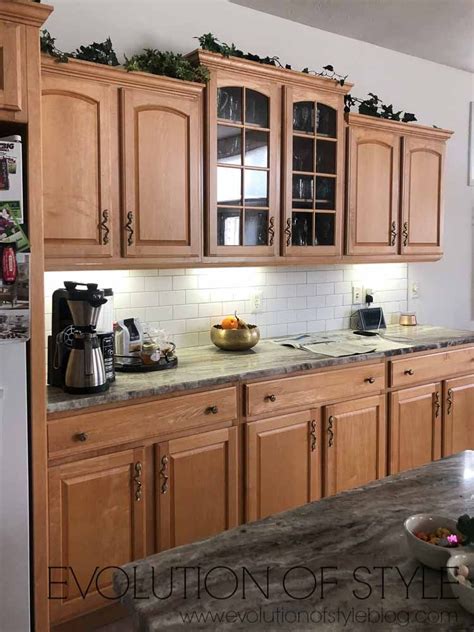The red roses decoration added the red effect into the set up. Mindful Gray Kitchen Cabinets in 2020 | Grey kitchen ...