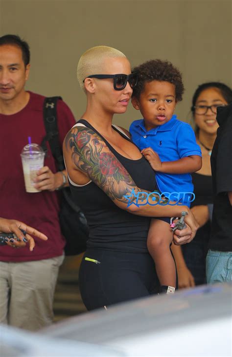 page 6 of 7 amber rose hugs and kisses son sebastian at airport after being apart