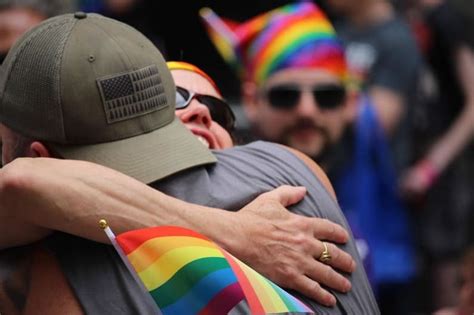 Father Offering Free Dad Hugs At Pride Parade Brings Marchers To