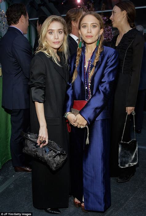 Ashley And Mary Kate Olsen Don Wide Leg Pantsuits In Nyc Daily Mail