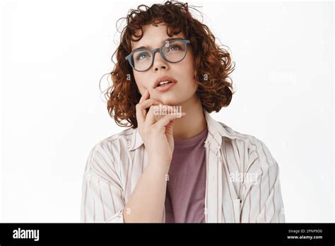 Portrait Of Young Girl Student Thinking Woman In Glasses Looking Up