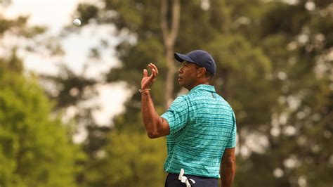 Masters Champion Tiger Woods Catches A Ball On The No 8 Green During