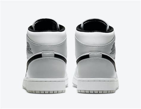 Black leather overlays, grey swooshes, wing logos, tongue and outsole atop a white midsole completes the design. Air Jordan 1 Mid Light Smoke Grey 554724-092 Release Date ...