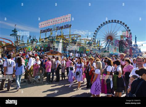 panorama view to street scene at world biggest beer festival oktoberfest in munich germany