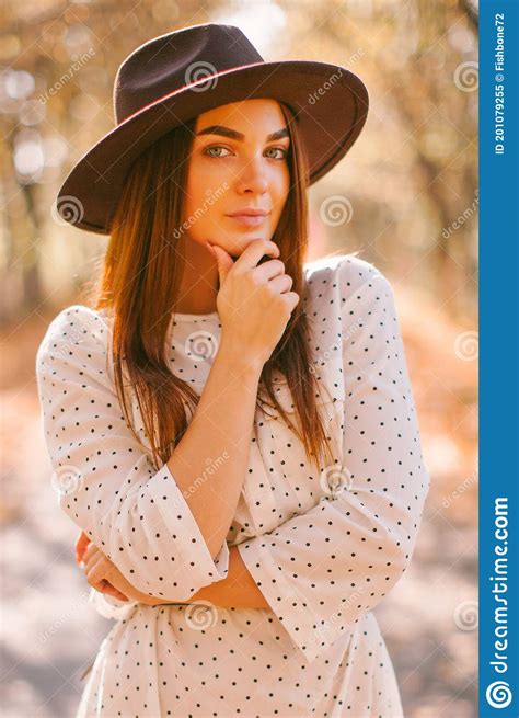 Girl Walks In A Dress And Hat In The Park Stock Image Image Of Girl