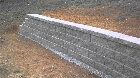 Blocks for retaining walls and concrete foundations. Concrete block retaining wall completed - YouTube