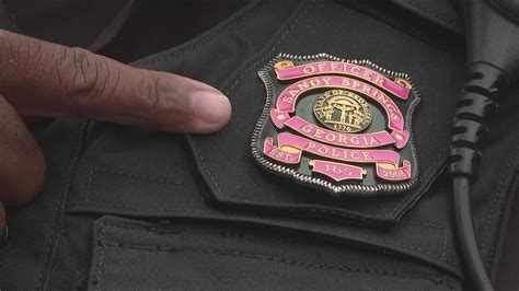 Sandy Springs Police Pink Badges Breast Cancer Awareness