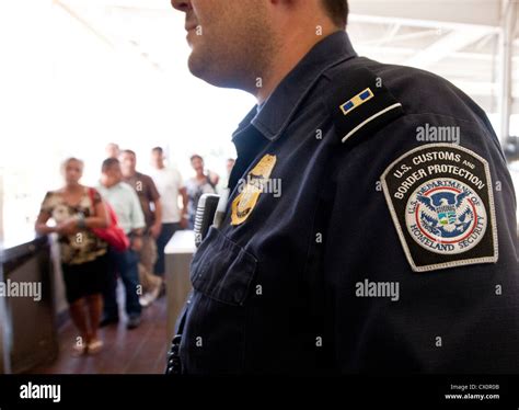 Us Customs And Border Protection Officers Attend To Ask For