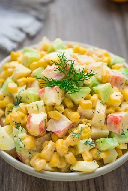 Featuring corn, eggs, rice, and cucumber, this russian salad version is comforting, filling, and really easy & quick to make! Recipe in 2020 | Crab salad, Imitation crab salad, Crab salad recipe