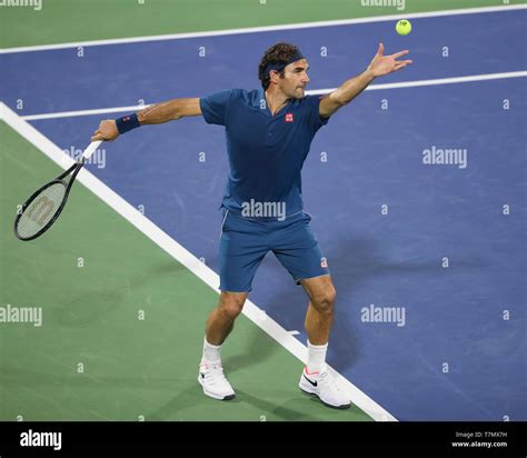 Swiss Tennis Player Roger Federer Serving During Dubai Tennis