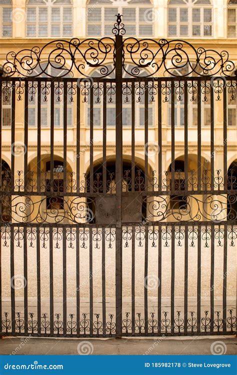 Ornate Wrought Iron Gate And The Entrance To A Courtyard Editorial