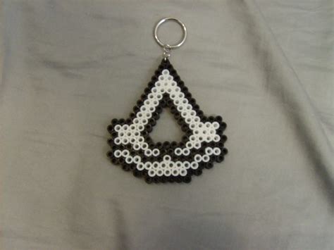 A Black And White Beaded Triangle Keychain