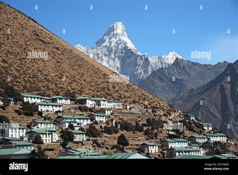 Ama Dablam Overlooking The Village Of Khumjung Stock Photo Alamy