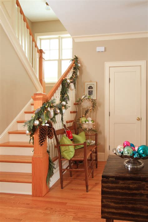 If your staircase is alongside a wall, make the most of that space with attractive wallpaper, framed pictures and artwork. 100 Awesome Christmas Stairs Decoration Ideas - DigsDigs