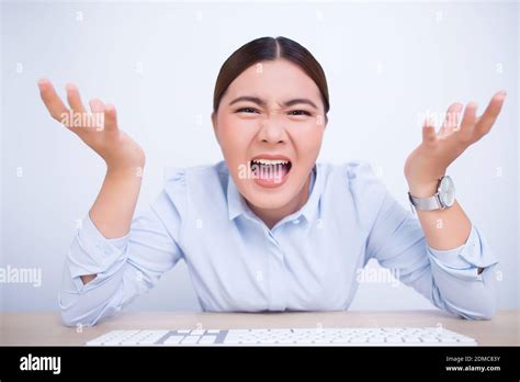 Angry Woman Screaming Out And Pulling Her Hair Stock Photo Alamy