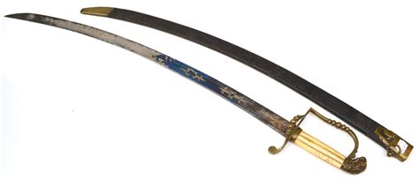 A 19th Century Sword With Curved Decorated Blade Brass Knuckle Guard