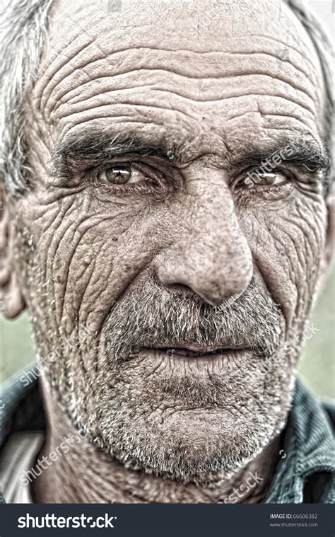 Closeup Portrait Of Old Man Wrinkled Elderly Skin Face Stock Photo