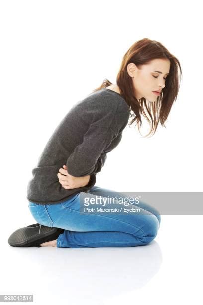 Kneeling Woman Photos And Premium High Res Pictures Getty Images