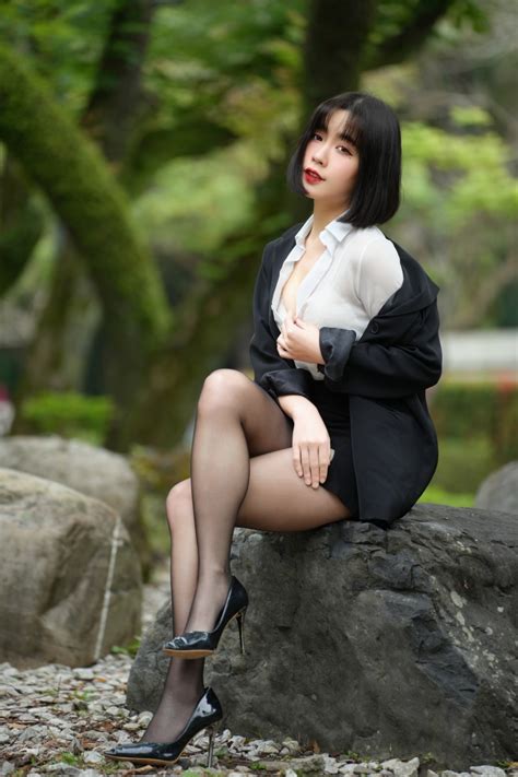 Asian Stones Brunette Girl Sitting Legs Pantyhose Stilettos