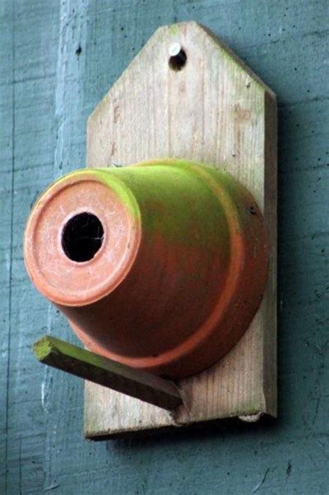 Niche D Oiseau Avec Un Pot De Fleur Diy Garden Garden Crafts Garden Projects Garden Pots