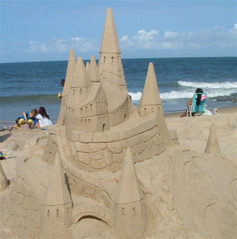 Sand Sculptures On The Beach Beach Sand Art Sand Castles
