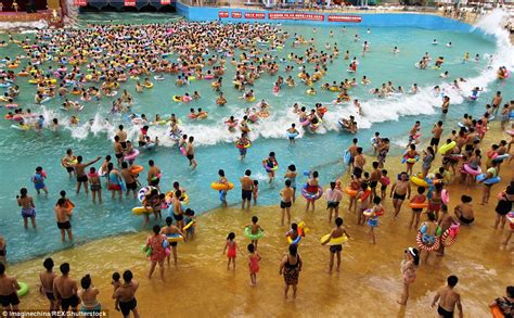 Chinese Tourists Cram Chinas Biggest Pool Named The Dead Sea On Hot