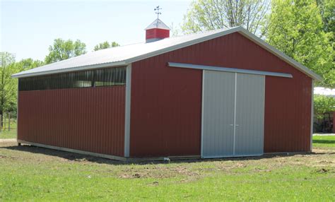 This simple animal shelter, a versatile pole barn building for livestock animals, such as cows, sheep, goats, pigs or poultry, or livestock feed can be constructed in a few weeks. Amish Country Barns