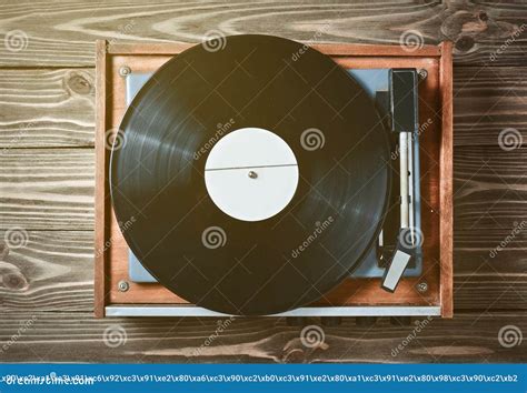 Vinyl Player With Plates On A Wooden Table Entertainment 70s Stock