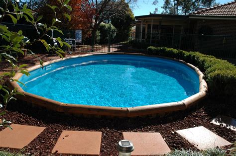 These are less expensive and can comfortably flush with your lawn or. Installing Semi Inground Pools | Small inground pool ...