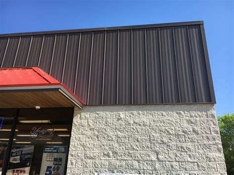 I'm having trouble picking an exterior color palette. Burnished Slate/Patriot Red Commercial Roofing - Reed's Metals