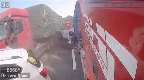Car Crushed In Between Two Trucks After One Loses Control On Chinese